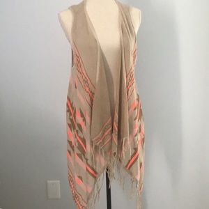 Lightweight long sleeveless cardigan. Like new.